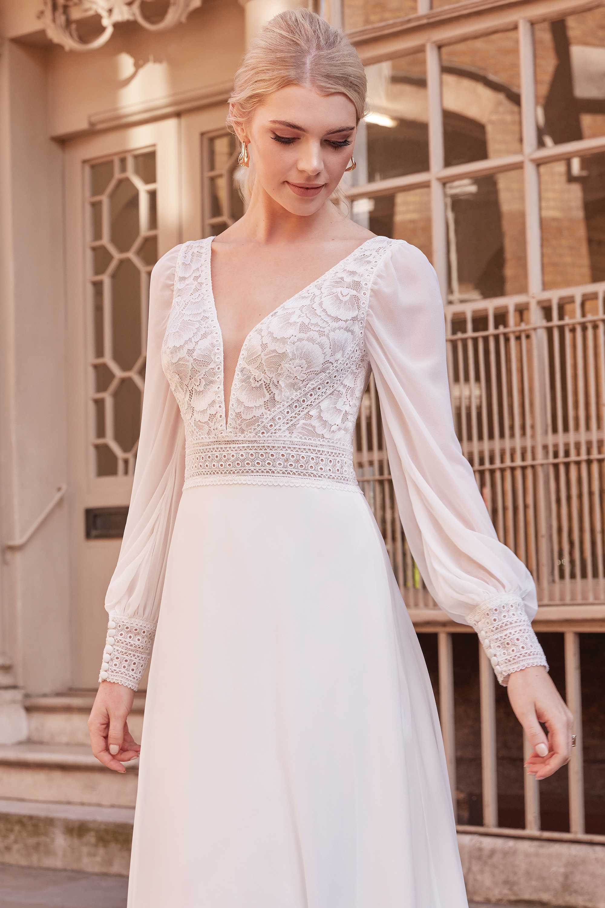 Fancy - wedding dress with long chiffon puff sleeves, lace top, open back and chiffon skirt Fancy - wedding dress with long chiffon puff sleeves, lace top, open back and chiffon skirt