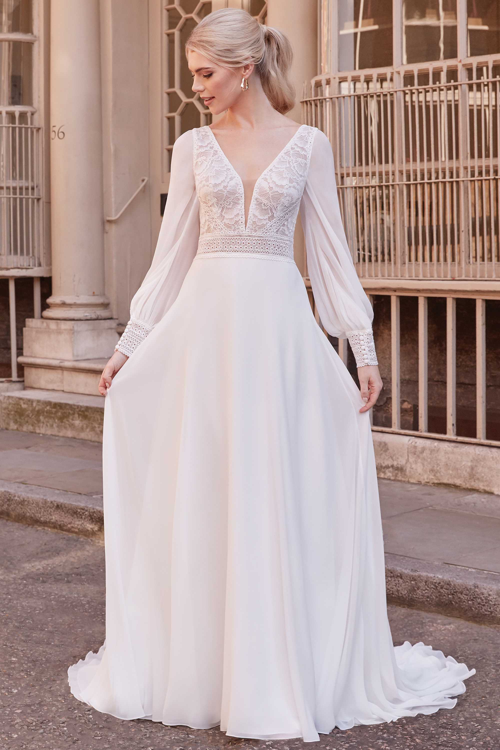 Fancy - wedding dress with long chiffon puff sleeves, lace top, open back and chiffon skirt Fancy - wedding dress with long chiffon puff sleeves, lace top, open back and chiffon skirt