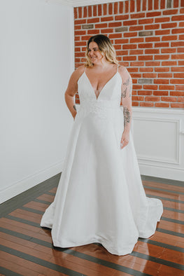 Cherie *sample size 22* - classic wedding dress with illusion plunging neckline, thin straps and cinched lace waist