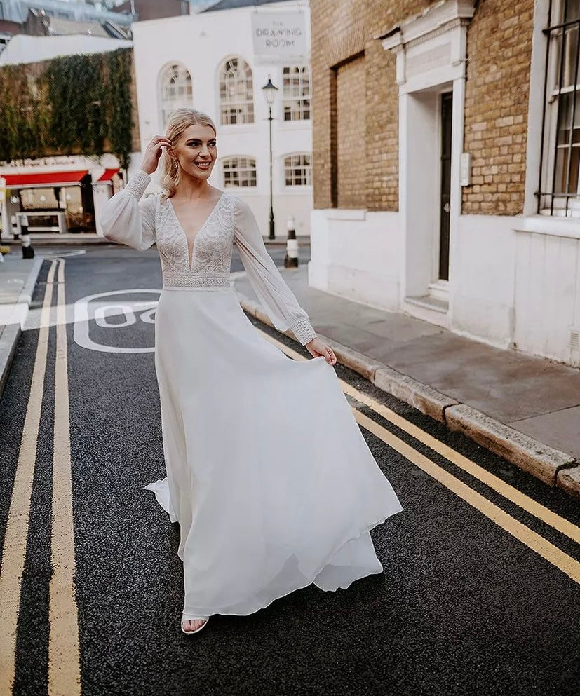 Fancy - wedding dress with long chiffon puff sleeves, lace top, open back and chiffon skirt Fancy - wedding dress with long chiffon puff sleeves, lace top, open back and chiffon skirt