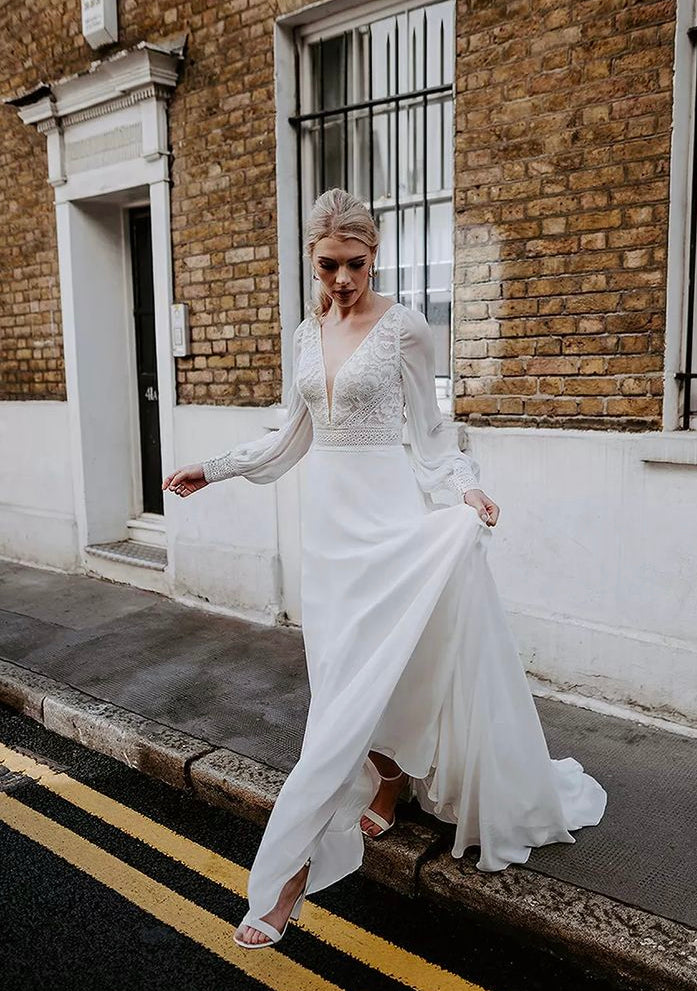 Fancy - wedding dress with long chiffon puff sleeves, lace top, open back and chiffon skirt Fancy - wedding dress with long chiffon puff sleeves, lace top, open back and chiffon skirt