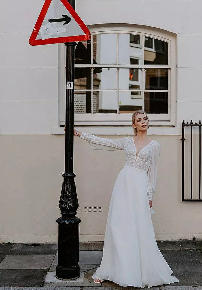 Fancy - wedding dress with long chiffon puff sleeves, lace top, open back and chiffon skirt Fancy - wedding dress with long chiffon puff sleeves, lace top, open back and chiffon skirt