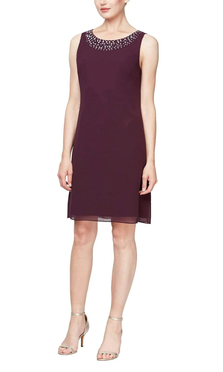 Birma *samples size 14 and size 16* - 2-piece set including a short, airy dress with beaded jewel at the collar and airy jacket with ¾ sleeves Birma *samples size 14 and size 16* - 2-piece set including a short, airy dress with beaded jewel at the collar and airy jacket with ¾ sleeves