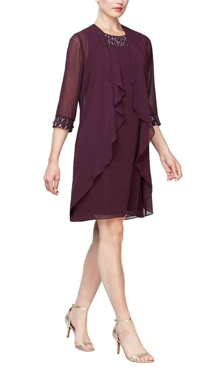 Birma *samples size 14 and size 16* - 2-piece set including a short, airy dress with beaded jewel at the collar and airy jacket with ¾ sleeves Birma *samples size 14 and size 16* - 2-piece set including a short, airy dress with beaded jewel at the collar and airy jacket with ¾ sleeves