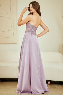 Tristan - Robe longue bustier à effet corset et jupe vaporeuse en satin avec fente
