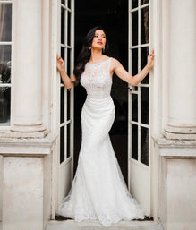 Kyle - high end boho glam inspired fitted wedding dress in luxurious lace with open back and tulle overskirt