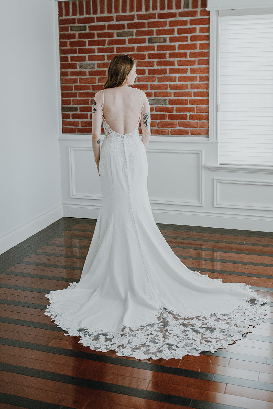 Delilah - slim fit crepe wedding dress with thin straps and totally open back