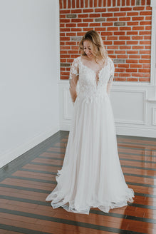 Joyce - boho wedding dress with long sleeves, round open back and illusion top