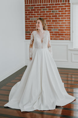 Carlyle - classic wedding dress with lace illusion plunging neckline and long sleeves
